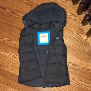 Hollister Puffer Vest with a hood in dark grey.